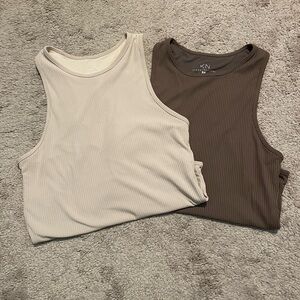 2 Klassy Network brand Bramis high neck body suits